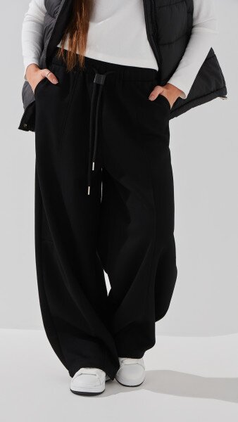 Купити Спортивні штани Baggy однотонні жіночі K.K 601 S Чорний Артикул: 2000991054271 Фото №1