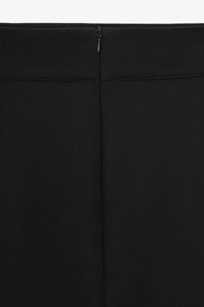 Купить Юбка однотонная женская On me 2340 baza 4XL Черный Артикул: 2000990991713 Фото №4