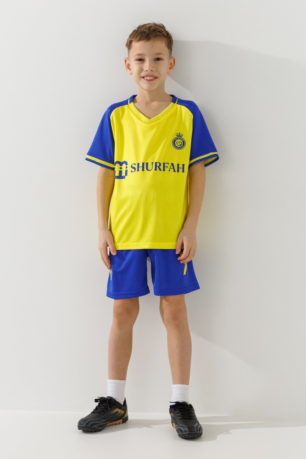 Купити Футбольна форма для хлопчика BLD AL NASSR RONALDO 110 см Синьо-жовтий Артикул: 2000990102157 Фото повноекранне №1